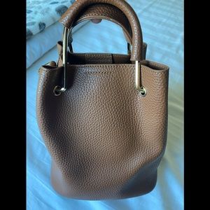 Faux leather purse .